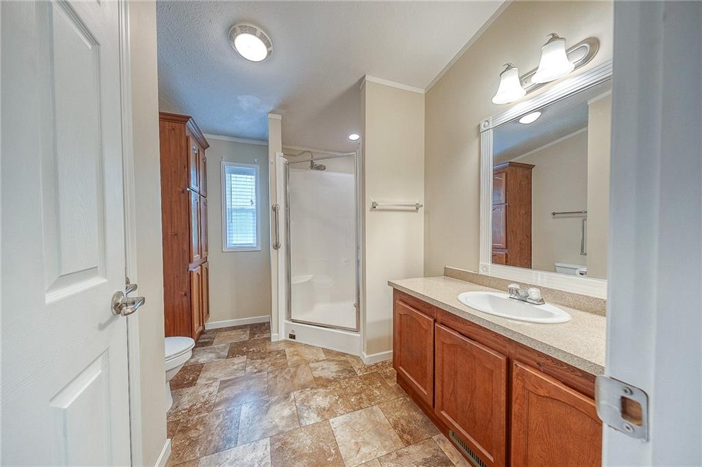 89 Delaware Drive Cheswick, PA 15024 - Photo 13 of 20 a spacious bathroom with a double vanity sink a mirror and a shower