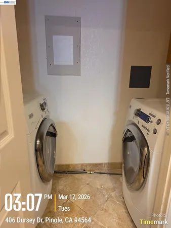 a utility room with dryer and washer