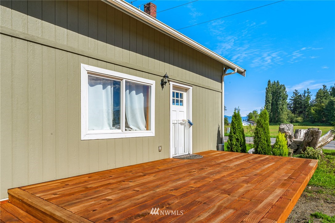 2890 East Badger Road Everson, WA 98247 - Photo 11 of 38 a front view of a house with a yard