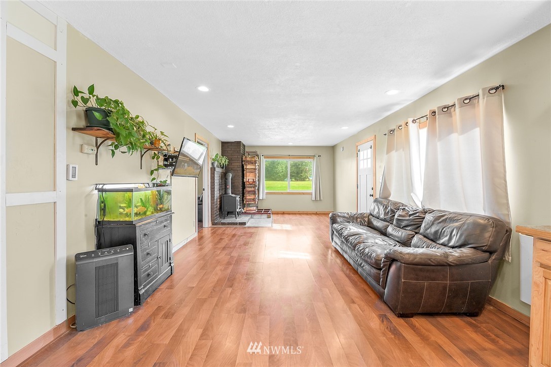 2890 East Badger Road Everson, WA 98247 - Photo 20 of 38 a living room with furniture and a large window