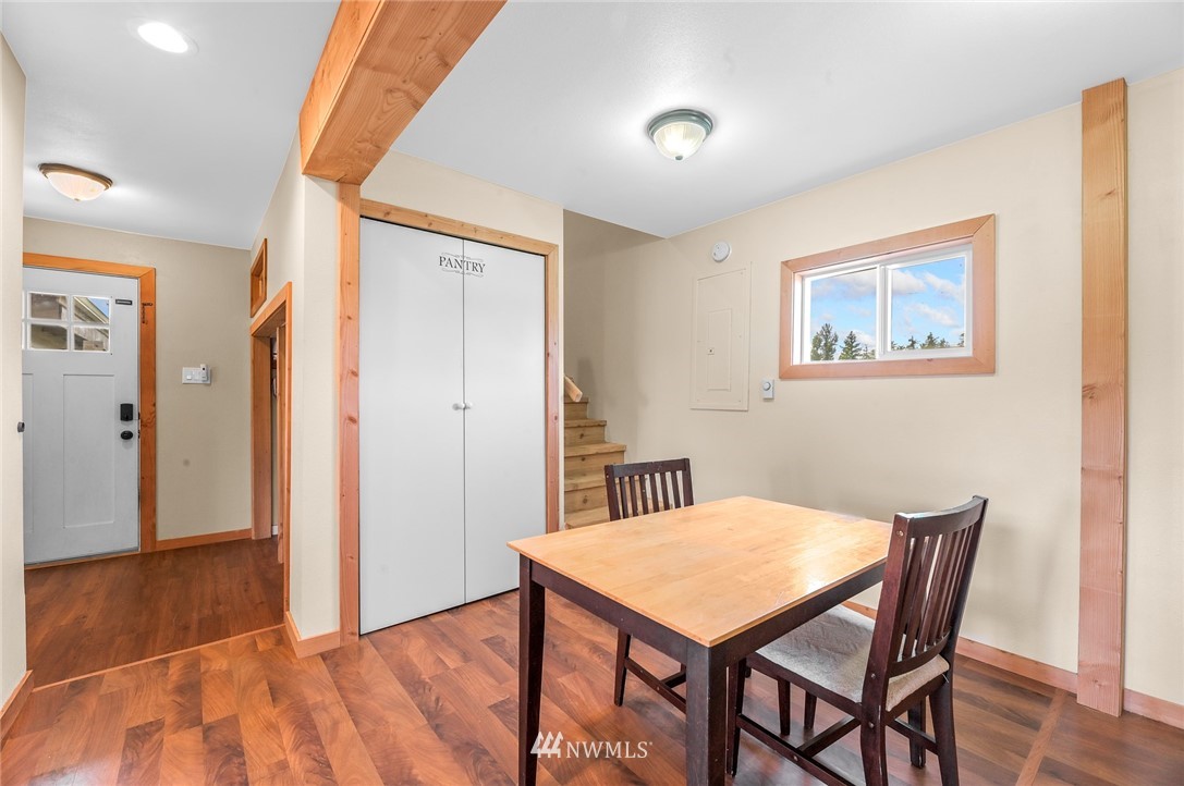 2890 East Badger Road Everson, WA 98247 - Photo 24 of 38 a view of a dining room with furniture and wooden floor