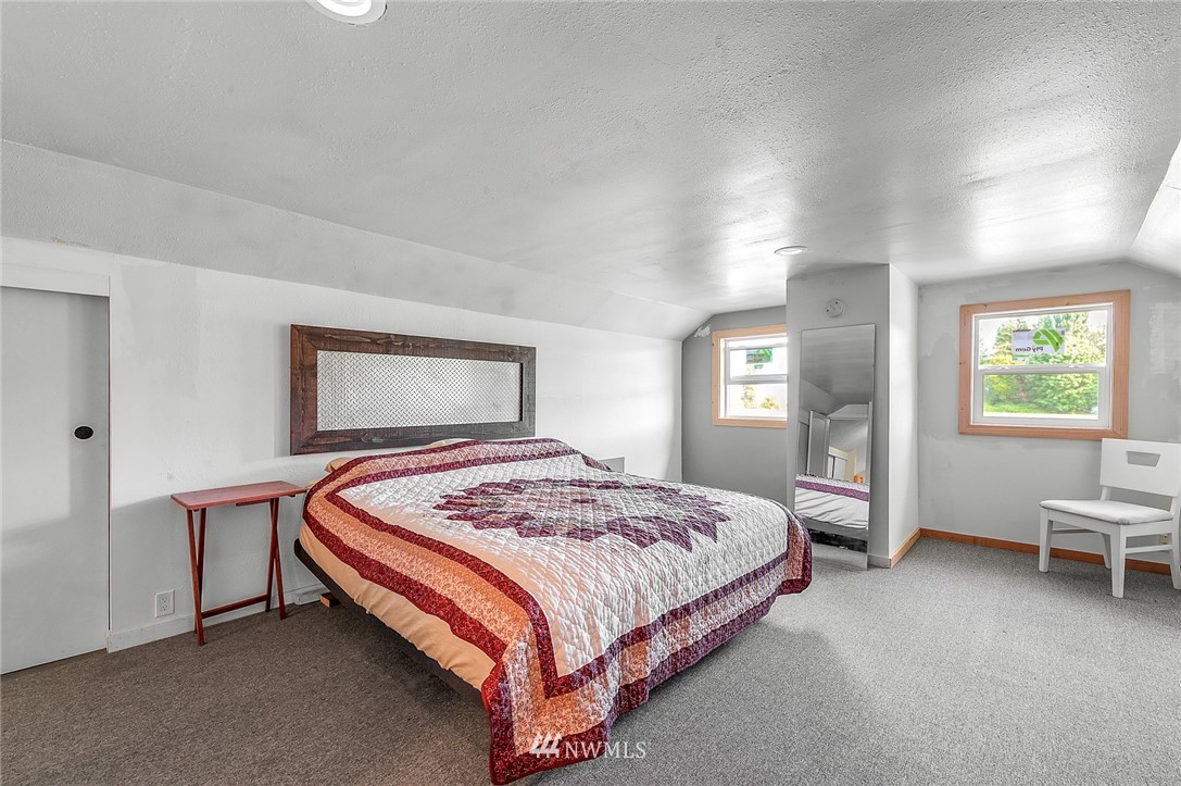 2890 East Badger Road Everson, WA 98247 - Photo 32 of 38 a bedroom with a bed and window