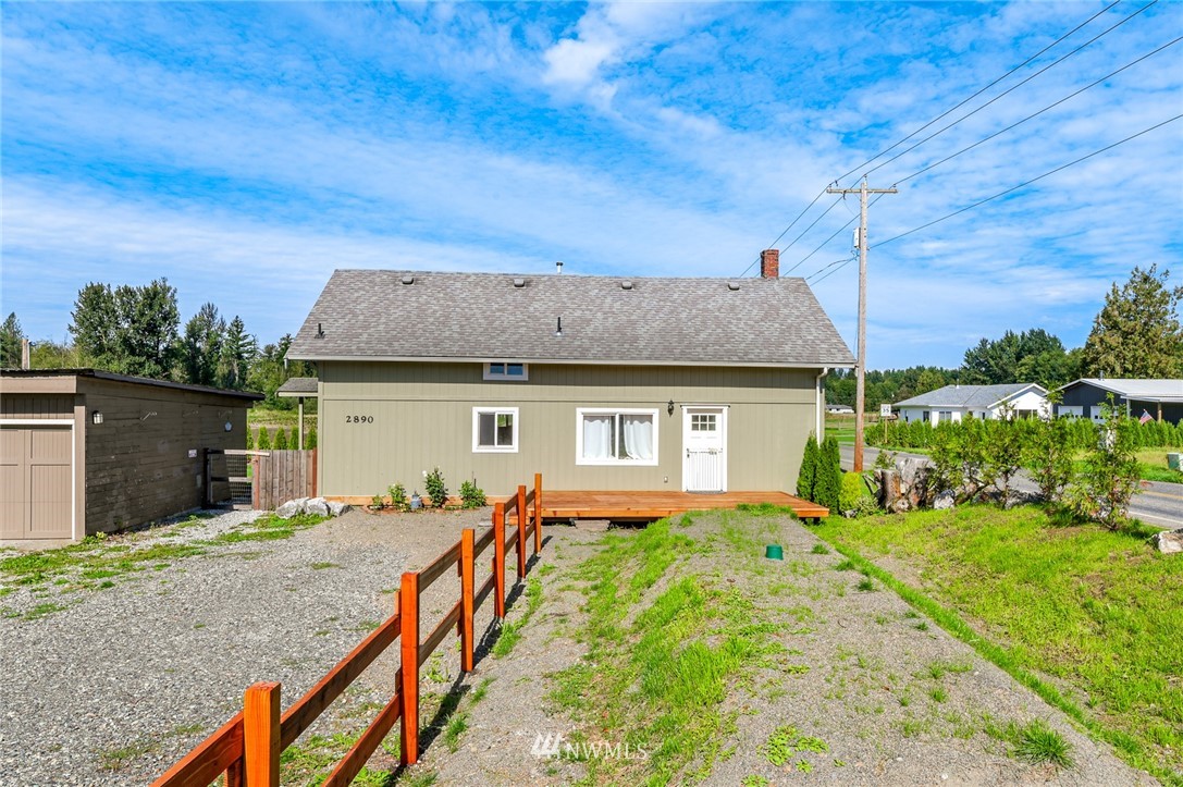 2890 East Badger Road Everson, WA 98247 - Photo 6 of 38 a front view of a house with a yard