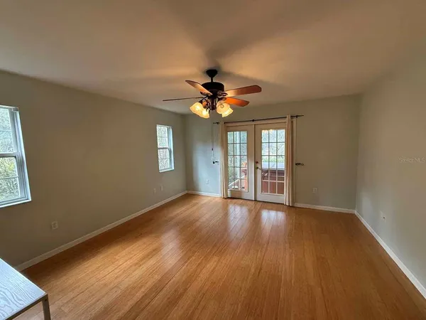 a view of an empty room with a window