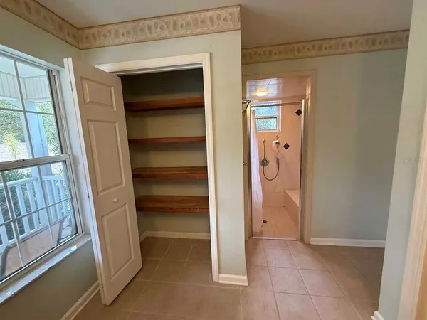 a view of an empty walk in closet