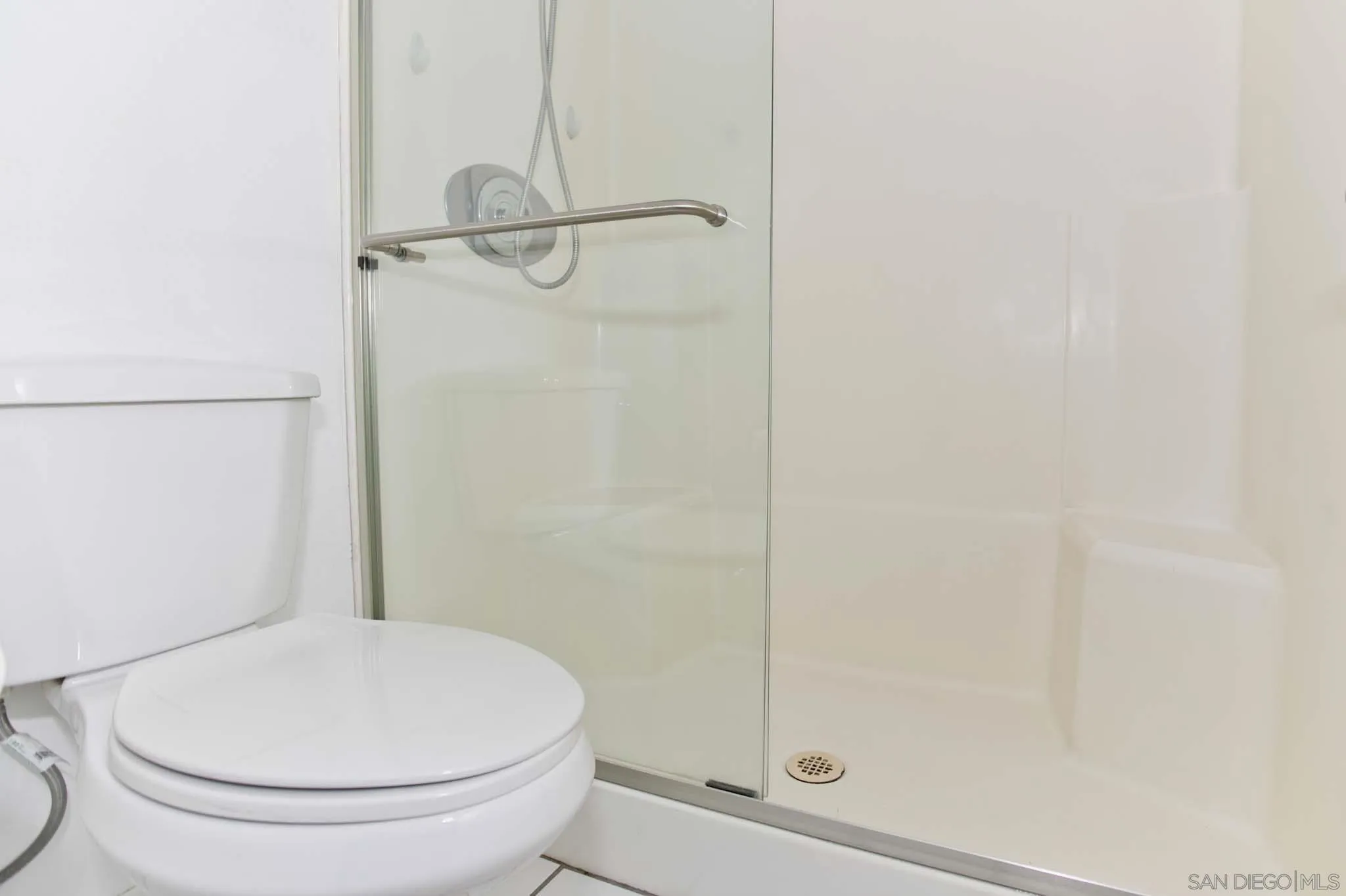 10076 West Glendon Circle Santee, CA 92071 - Photo 21 of 35 a bathroom with a toilet and a shower