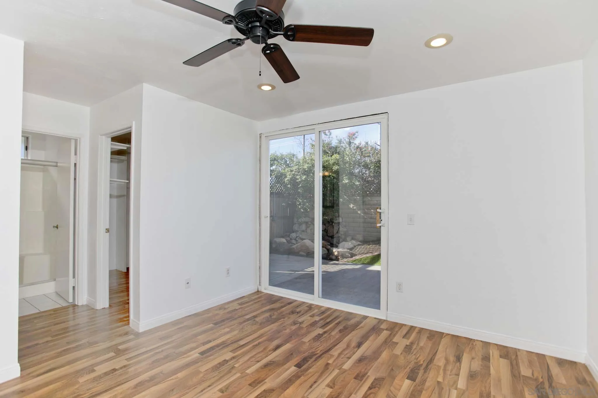 10076 West Glendon Circle Santee, CA 92071 - Photo 24 of 35 a view of empty room with wooden floor and fan
