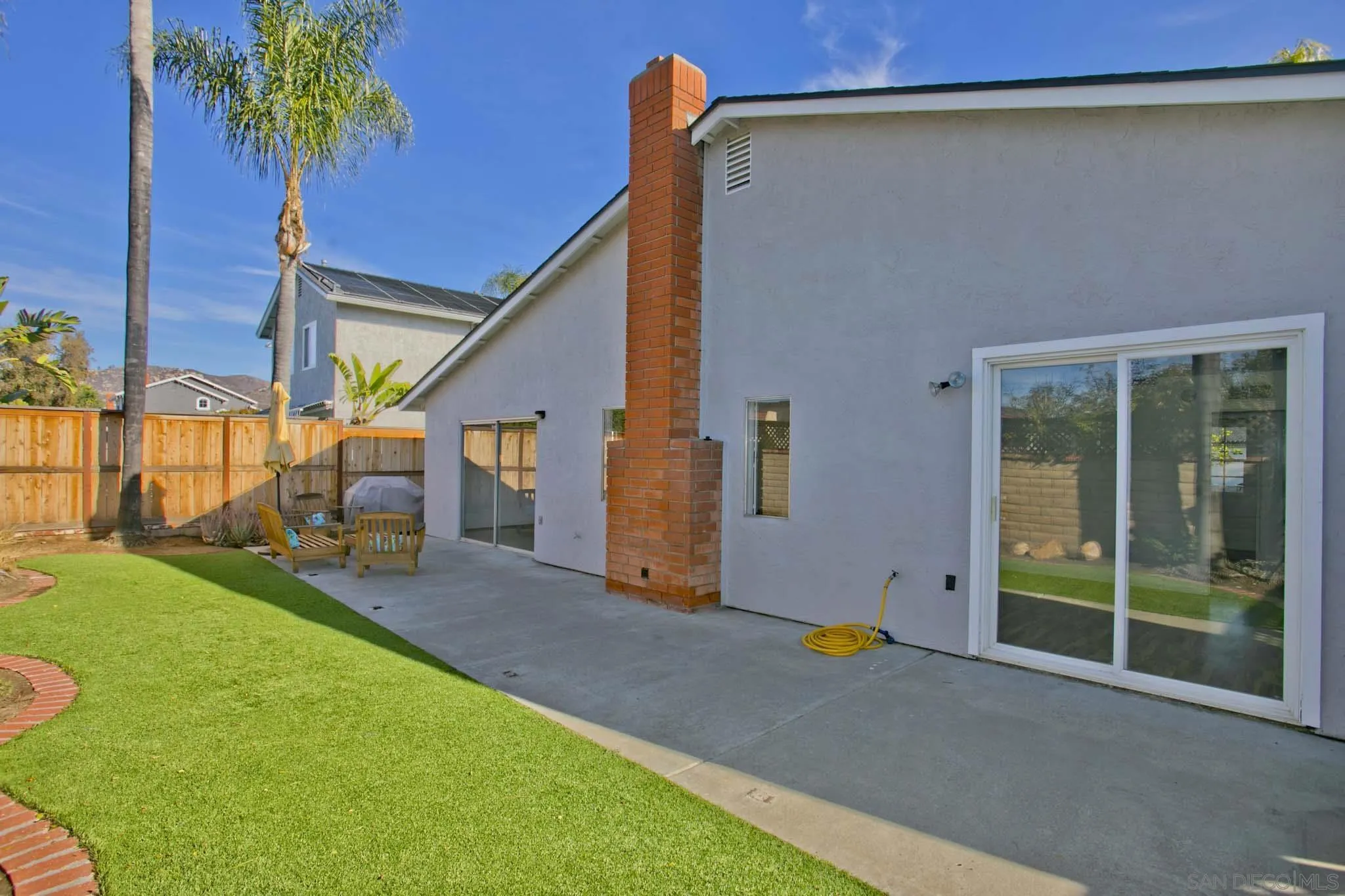 10076 West Glendon Circle Santee, CA 92071 - Photo 28 of 35 a view of a house with backyard and a tree