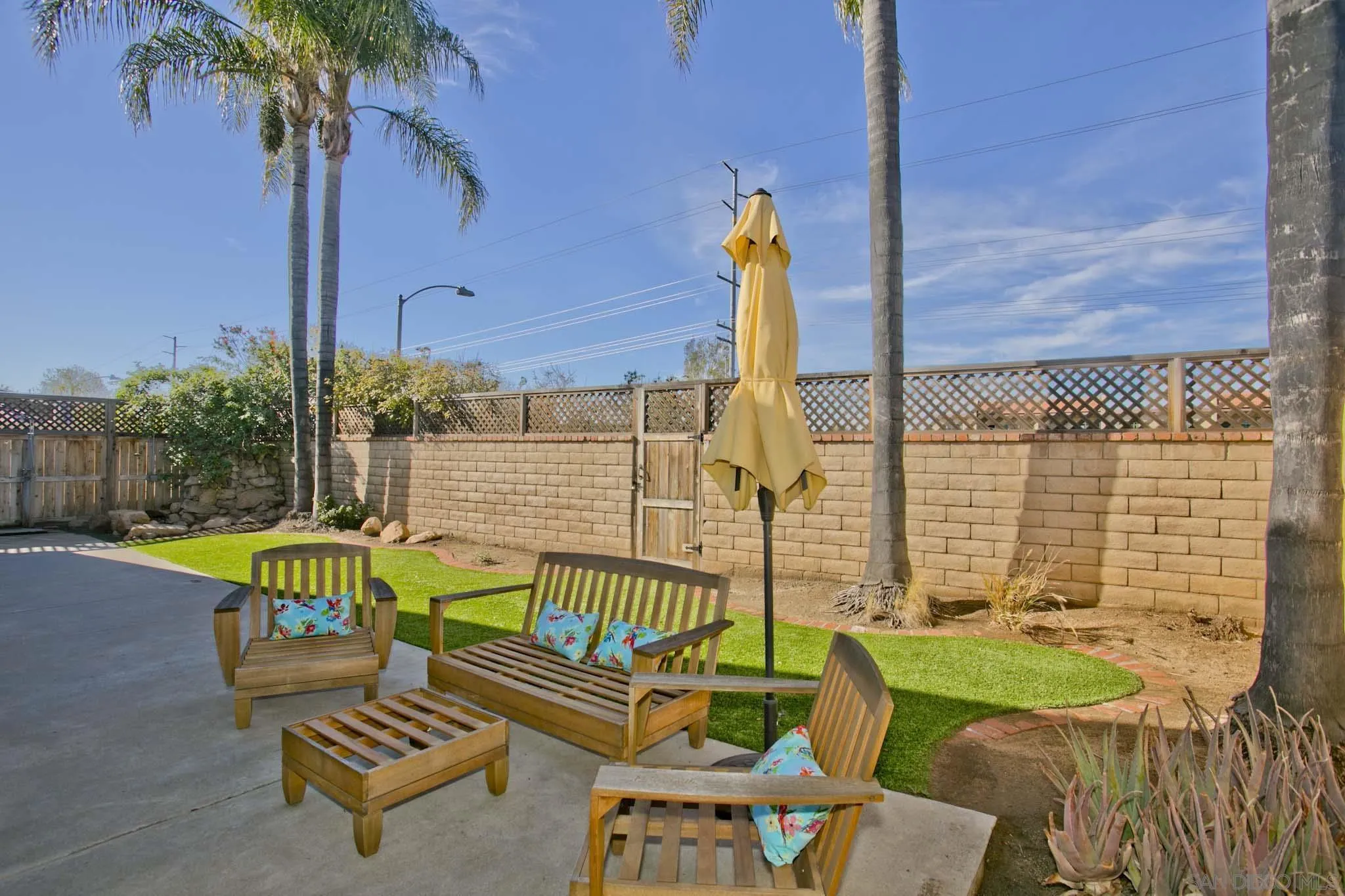 10076 West Glendon Circle Santee, CA 92071 - Photo 30 of 35 a swimming pool with outdoor seating and yard