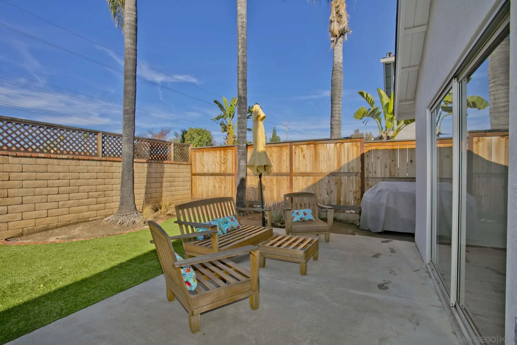 10076 West Glendon Circle Santee, CA 92071 - Photo 31 of 35 a backyard of a house with table and chairs