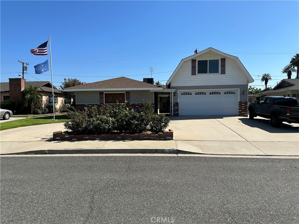 3474 Carlsbad Way Riverside, CA 92506 - Photo 1 of 1 a front view of a house with a yard