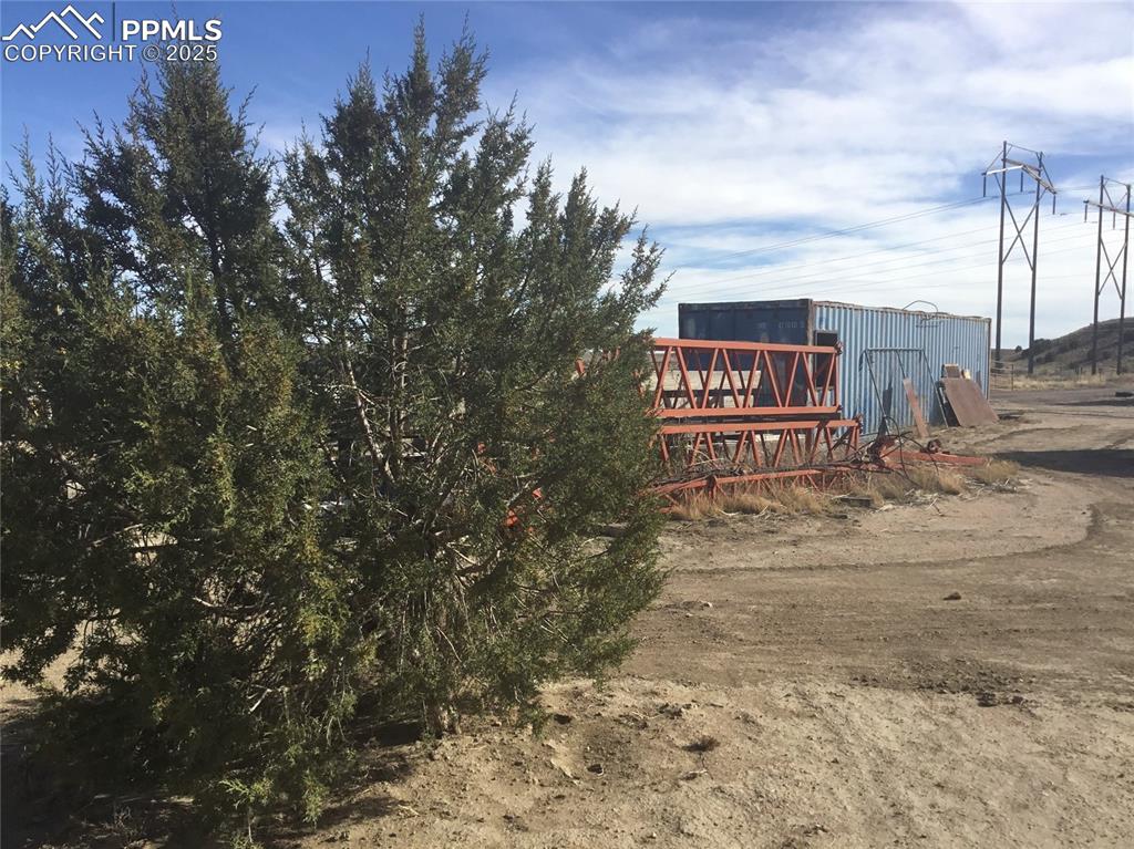4407 Salt Cedar Road Fountain, CO 80817 - Photo 11 of 25 a view of a street with sign board