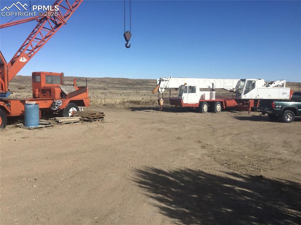 4407 Salt Cedar Road Fountain, CO 80817 - Photo 15 of 25 a view of a car park in front of a house