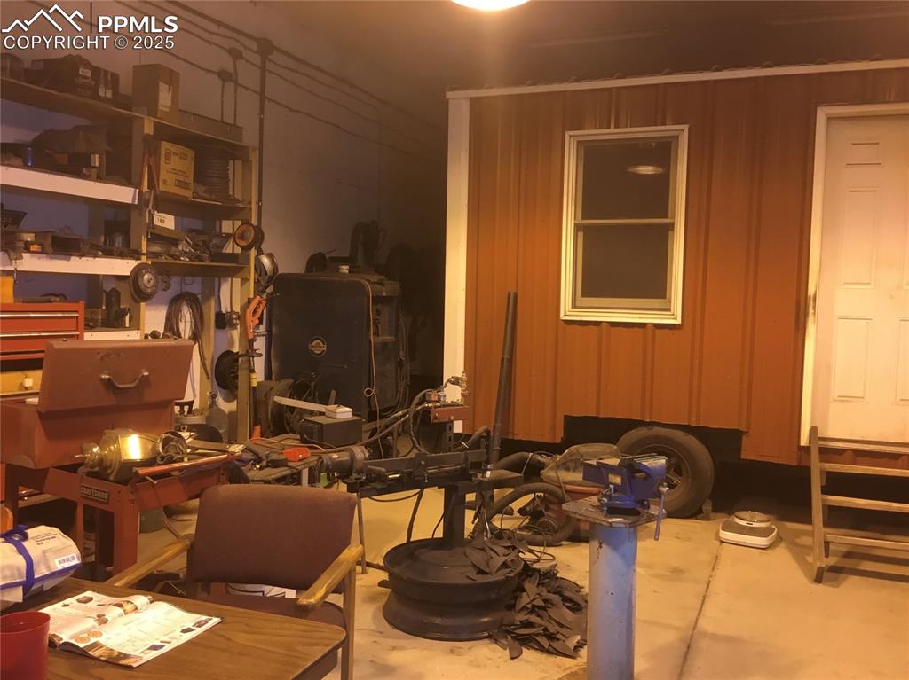 4407 Salt Cedar Road Fountain, CO 80817 - Photo 17 of 25 a room with furniture and musical instruments