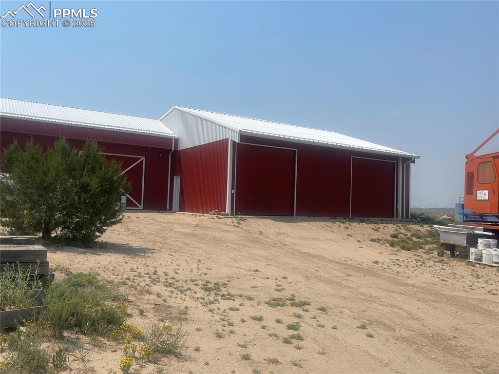 4407 Salt Cedar Road Fountain, CO 80817 - Photo 2 of 25 a view of a house with a yard