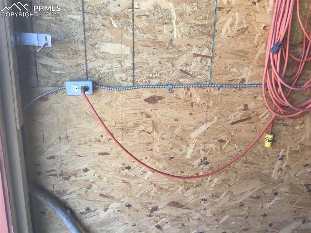 4407 Salt Cedar Road Fountain, CO 80817 - Photo 21 of 25 a view of a livingroom with wooden floor