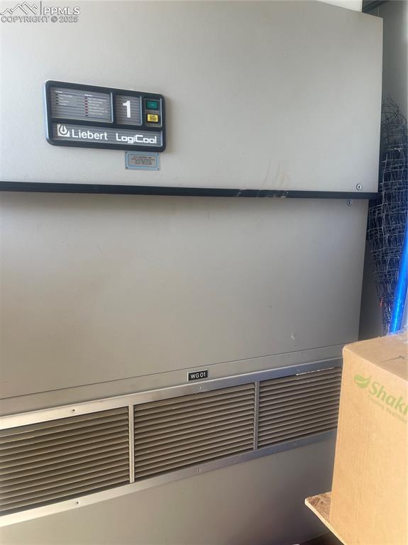 4407 Salt Cedar Road Fountain, CO 80817 - Photo 9 of 25 a view of a room with washer and dryer