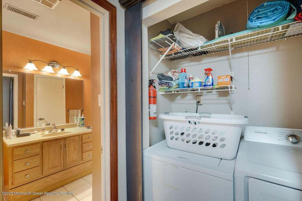 89 Northrup Drive, Unit 75 Brick, NJ 08724 - Photo 21 of 24 a room with storage and utility