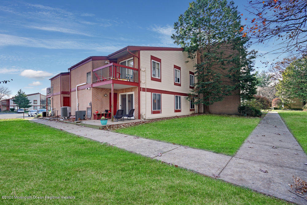 89 Northrup Drive, Unit 75 Brick, NJ 08724 - Photo 22 of 24 a view of a yard in front of house