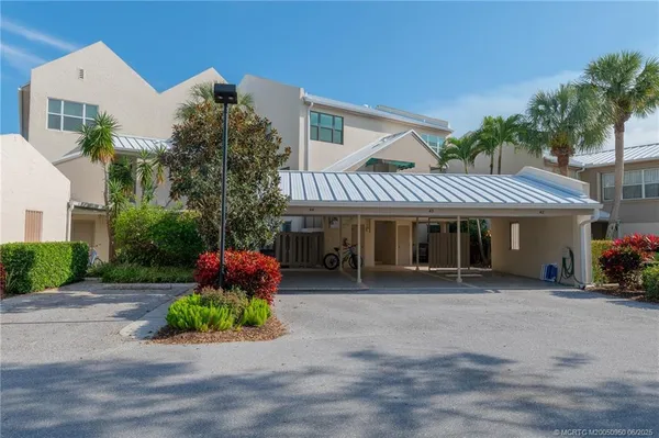 a front view of a house with a porch
