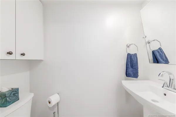 a spacious bedroom with a large bed and a window