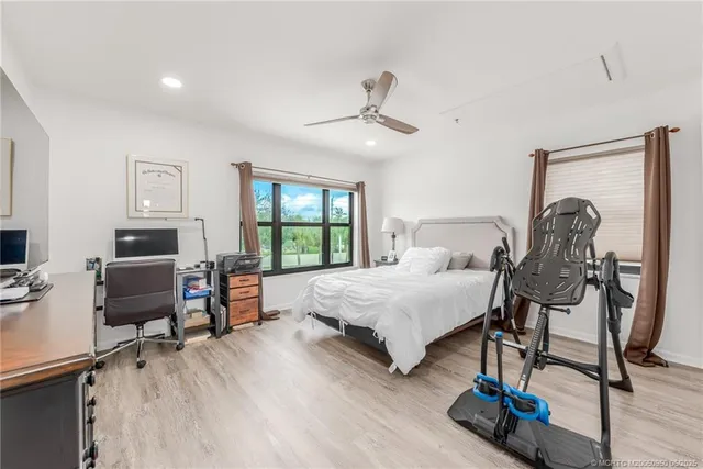 an aerial view of a house with a garden