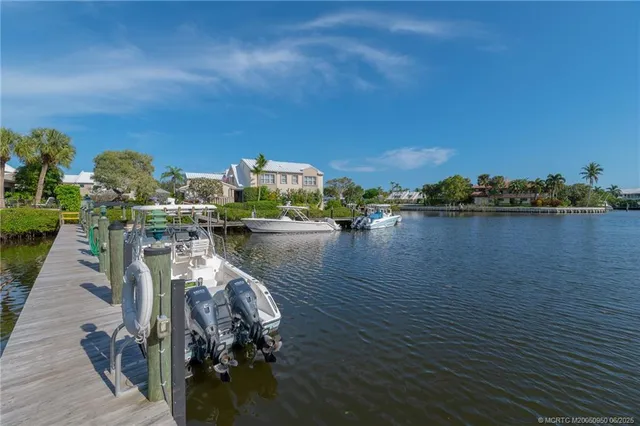 a view of a lake with sitting area