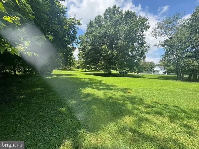 a view of a cafe with sitting area
