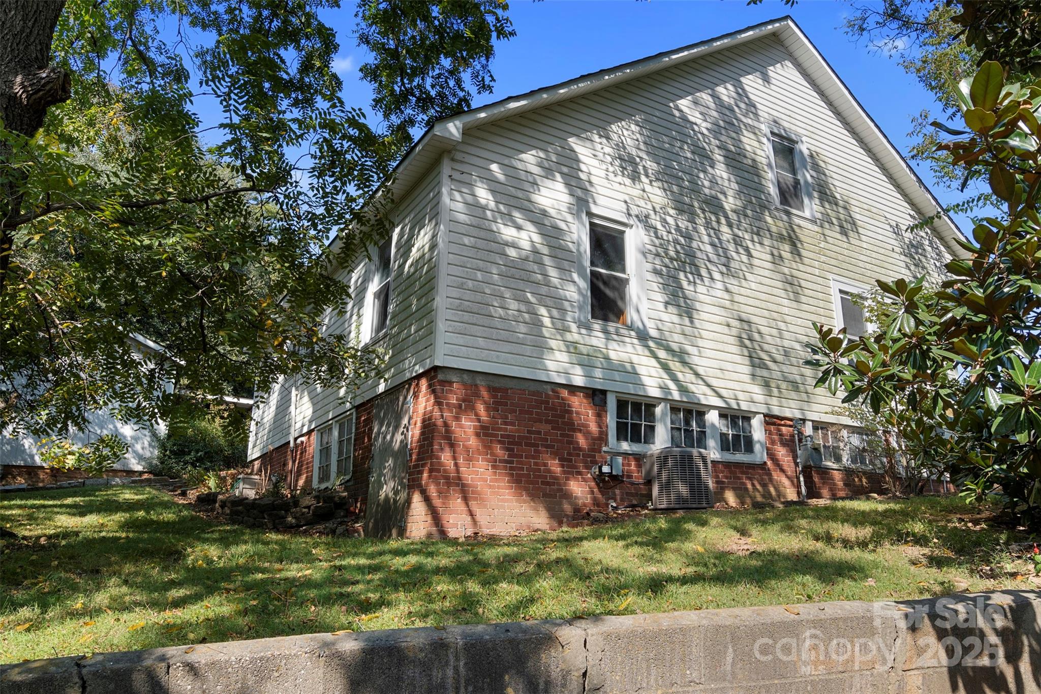 4601 Mooresville Road Kannapolis, NC 28081 - Photo 24 of 33 a view of a house with a yard