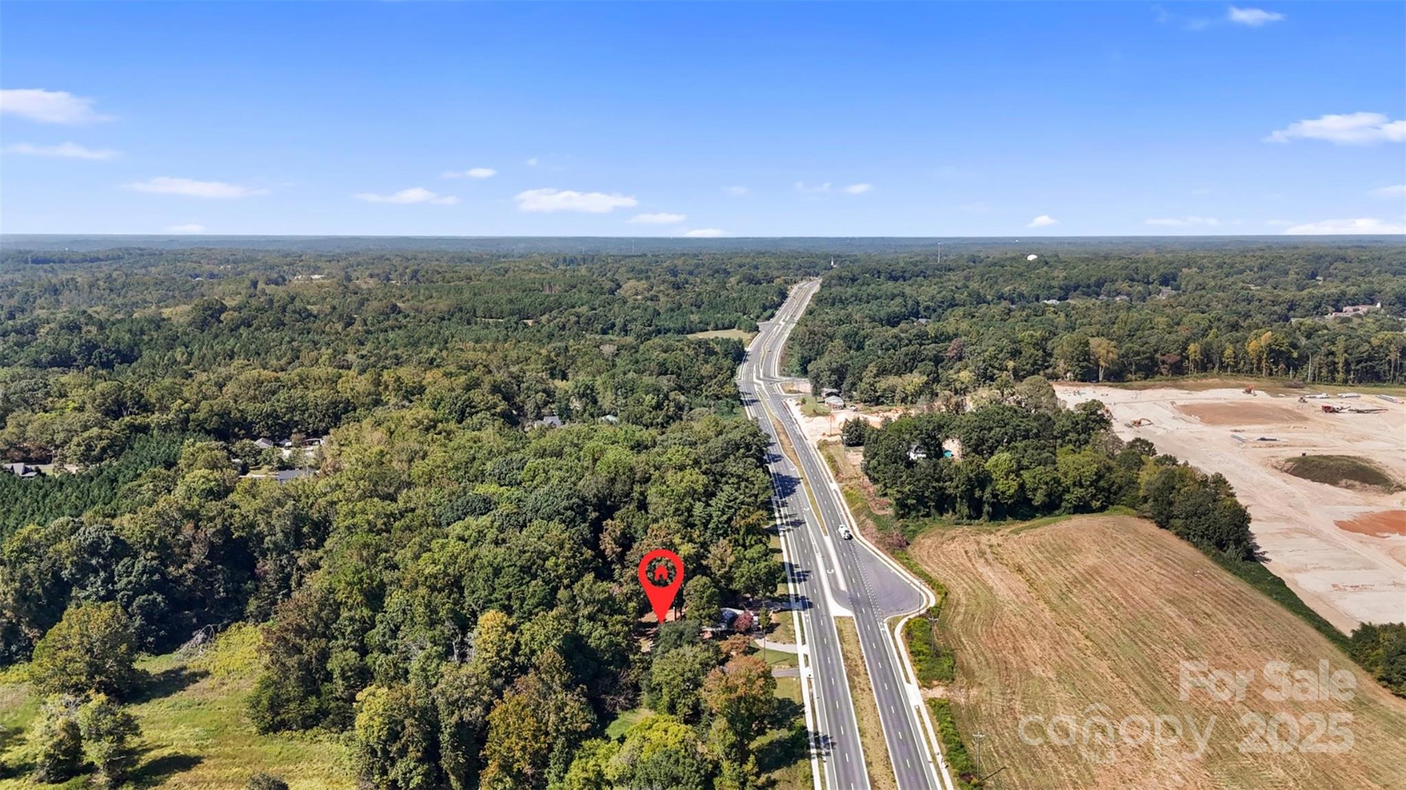 4601 Mooresville Road Kannapolis, NC 28081 - Photo 33 of 33 a view of a city with lush green forest