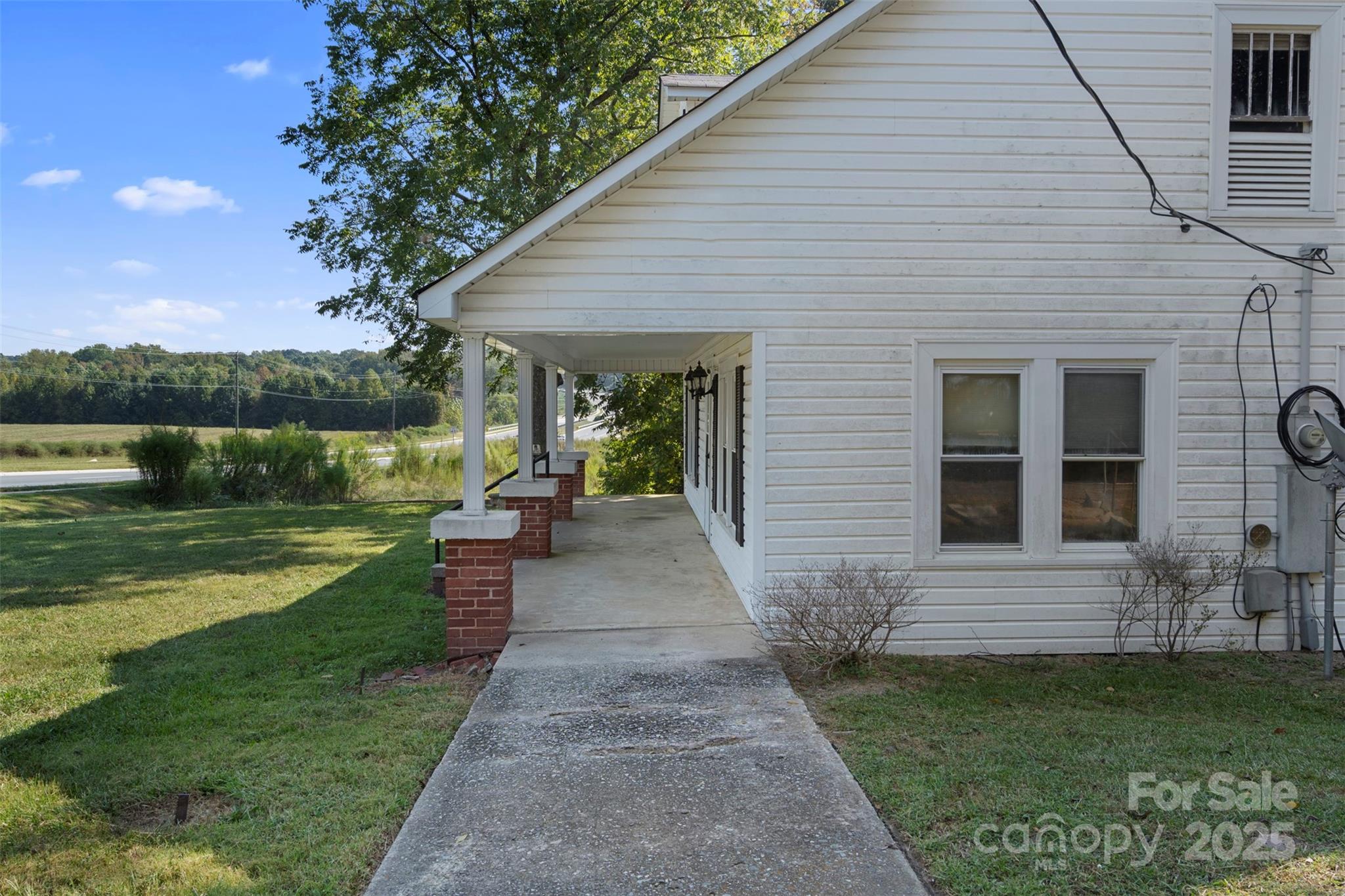 4601 Mooresville Road Kannapolis, NC 28081 - Photo 5 of 33 a view of a house with garden and a garden