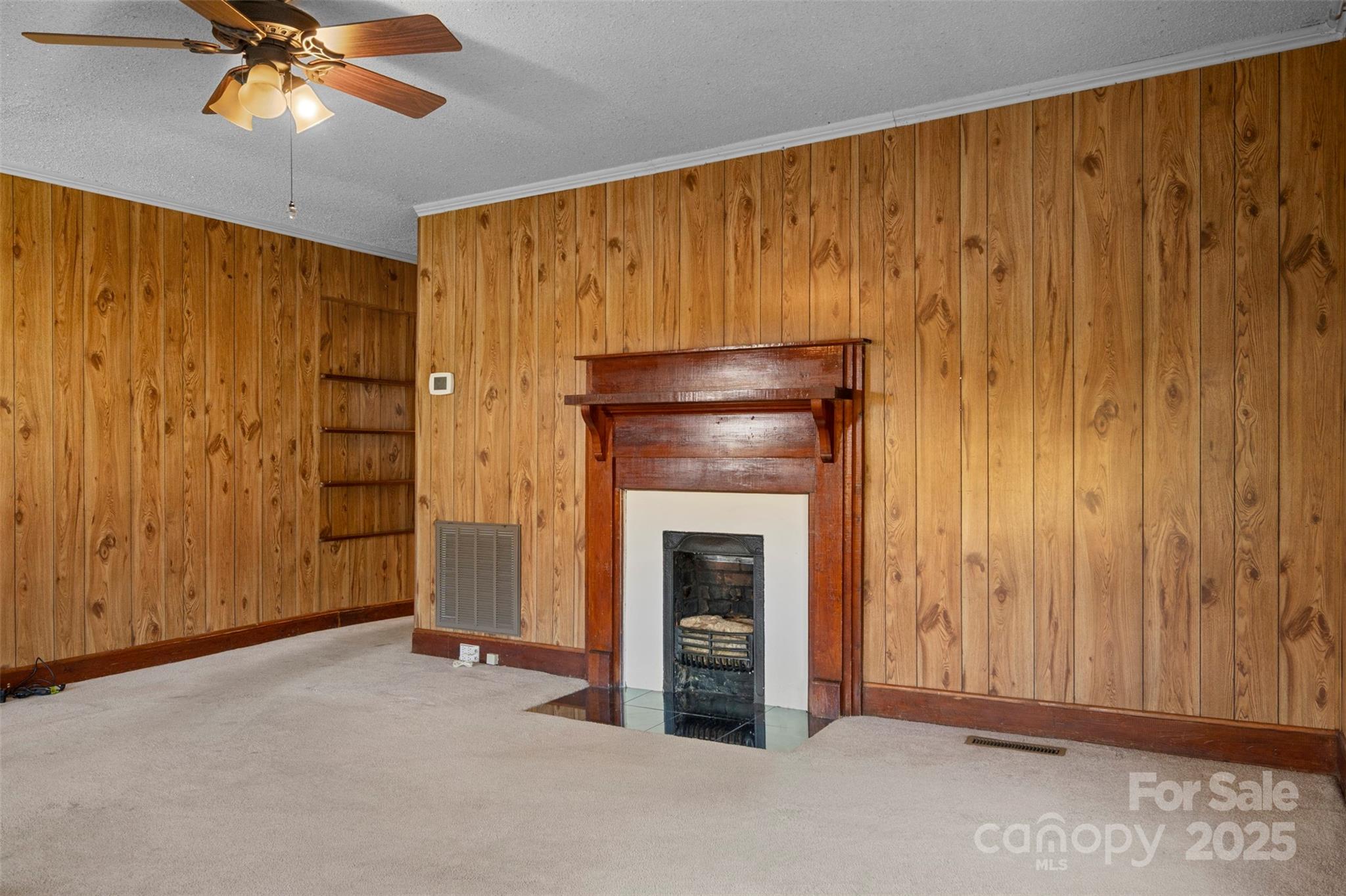 4601 Mooresville Road Kannapolis, NC 28081 - Photo 8 of 33 an empty room with closet and fan