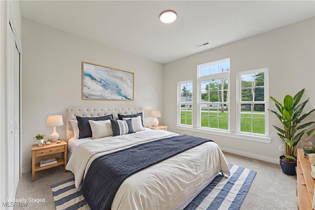7605 Lake Road East Madison, OH 44057 - Photo 26 of 50 Virtual staging: Bedroom with light carpet and baseboards