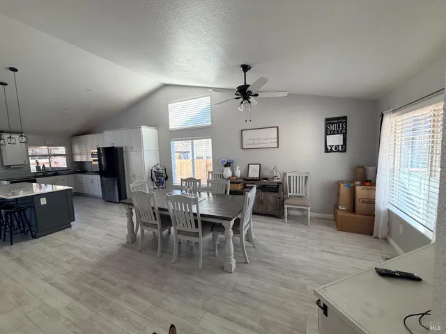 a view of a dining room with furniture