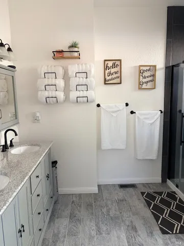 a room with cabinets and wooden floor