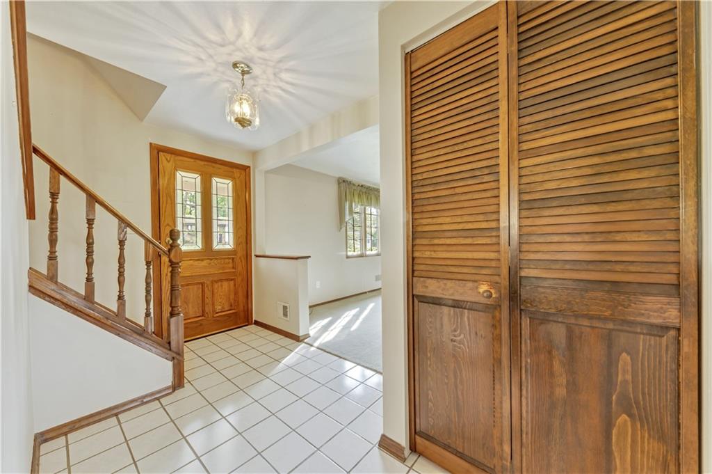 1004 Fiddleback Drive McKees Rocks, PA 15136 - Photo 12 of 25 a view of entryway and hall with wooden floor