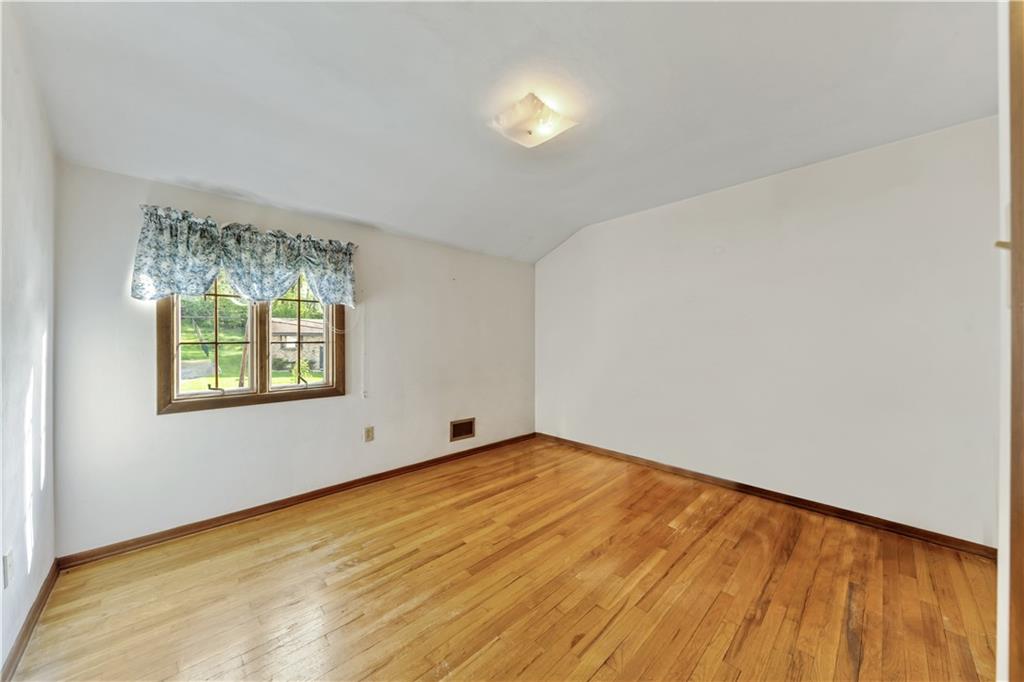 1004 Fiddleback Drive McKees Rocks, PA 15136 - Photo 17 of 25 a view of an empty room with a window