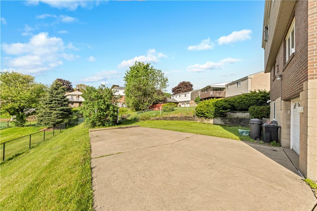 1004 Fiddleback Drive McKees Rocks, PA 15136 - Photo 23 of 25 a view of an outdoor space and a yard