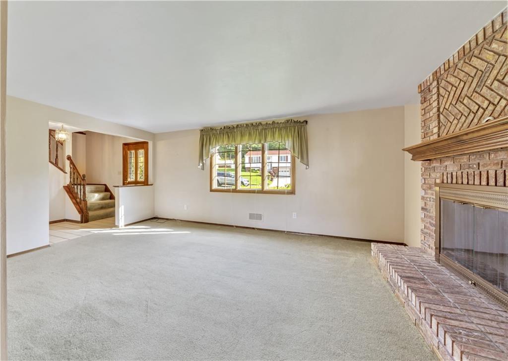 1004 Fiddleback Drive McKees Rocks, PA 15136 - Photo 4 of 25 an empty room with windows