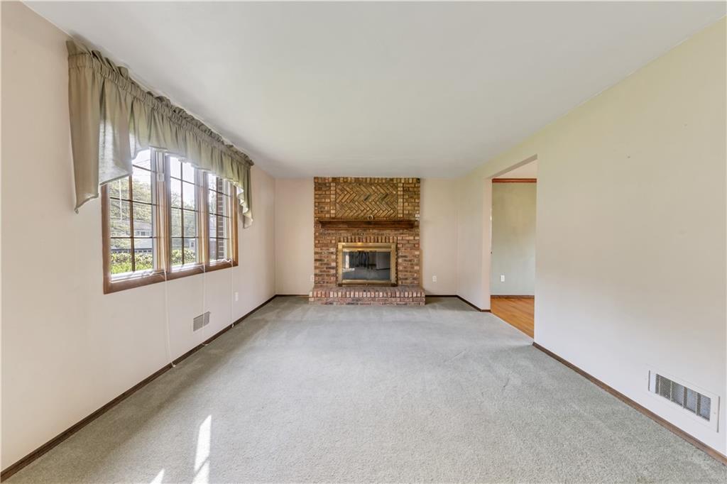 1004 Fiddleback Drive McKees Rocks, PA 15136 - Photo 5 of 25 a view of an empty room with a window