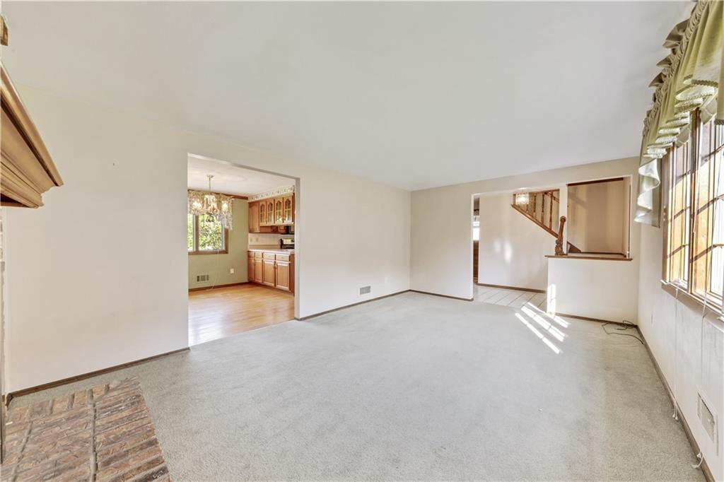1004 Fiddleback Drive McKees Rocks, PA 15136 - Photo 6 of 25 an empty room with entrance and windows
