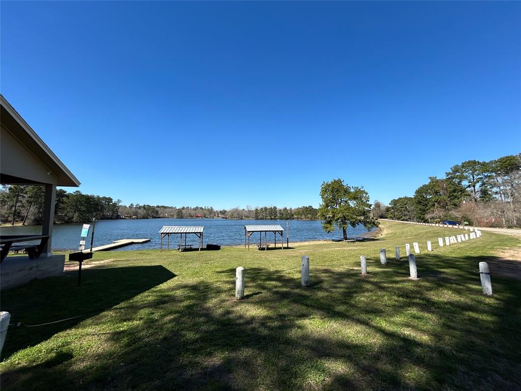 a view of lake with green space