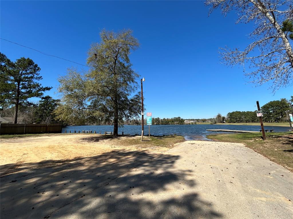 0 Royal Creek Road Conroe, TX 77303 - Photo 13 of 19 a view of lake with houses
