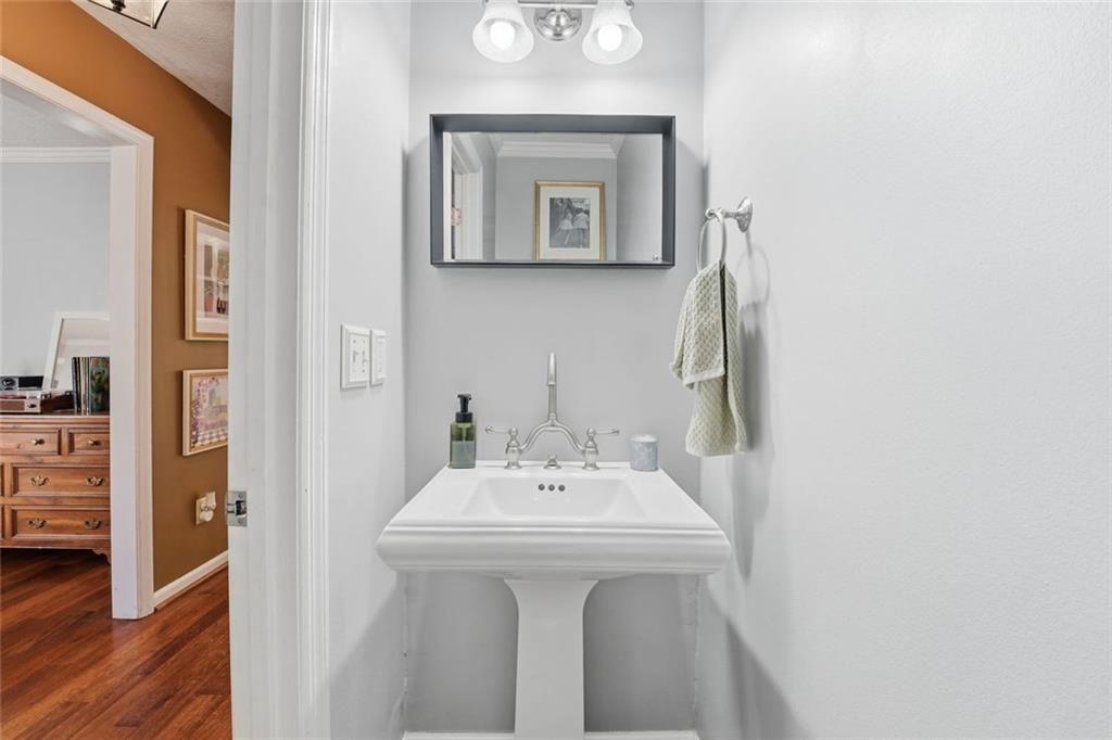 4766 McKee Court Southwest Mableton, GA 30126 - Photo 17 of 33 a bathroom with a sink and a mirror
