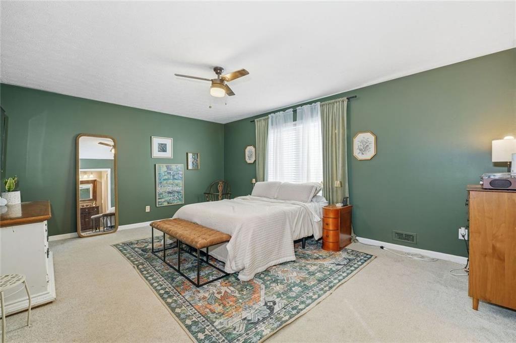 4766 McKee Court Southwest Mableton, GA 30126 - Photo 18 of 33 a bedroom with a bed dresser and a window