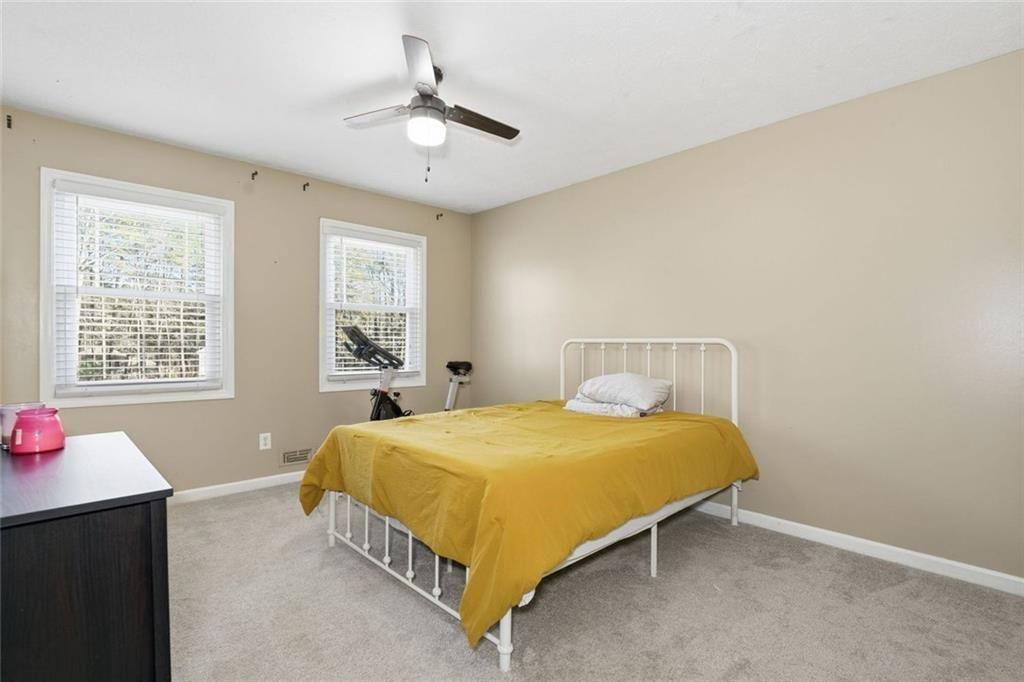 4766 McKee Court Southwest Mableton, GA 30126 - Photo 22 of 33 a bedroom with a bed and window