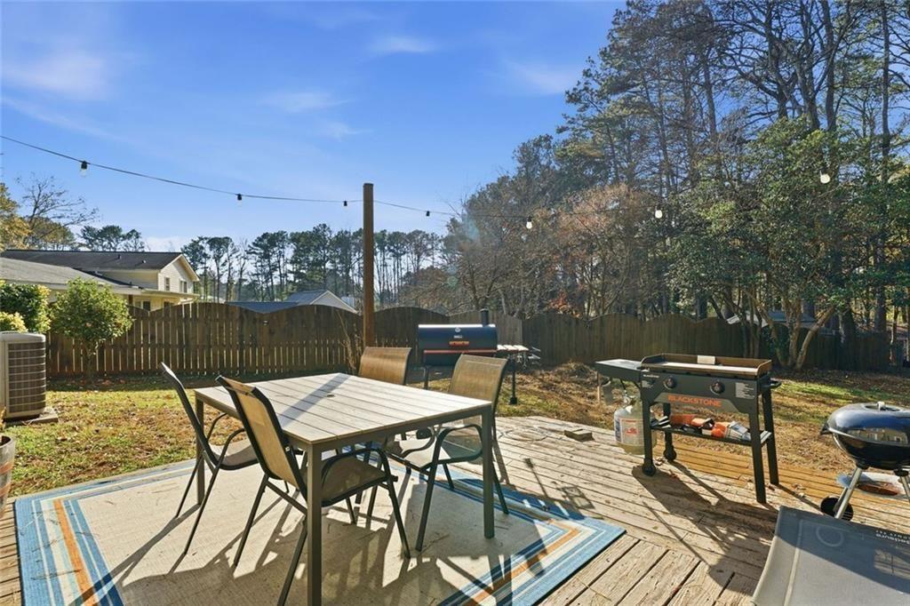 4766 McKee Court Southwest Mableton, GA 30126 - Photo 25 of 33 a view of a patio with iron deck and furniture