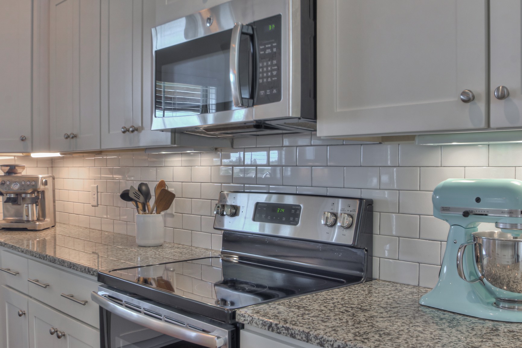 6032 Sanmar Drive Spring Hill, TN 37174 - Photo 11 of 29 a kitchen with a stove and cabinets