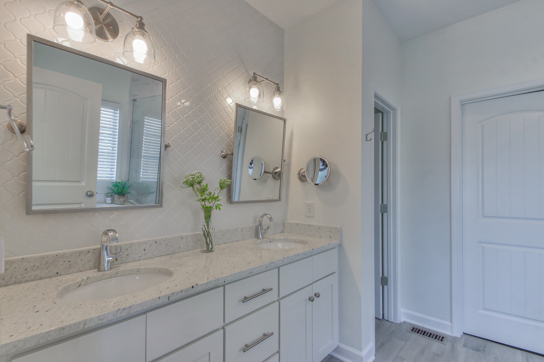 6032 Sanmar Drive Spring Hill, TN 37174 - Photo 17 of 29 a bathroom with double sink and a mirror