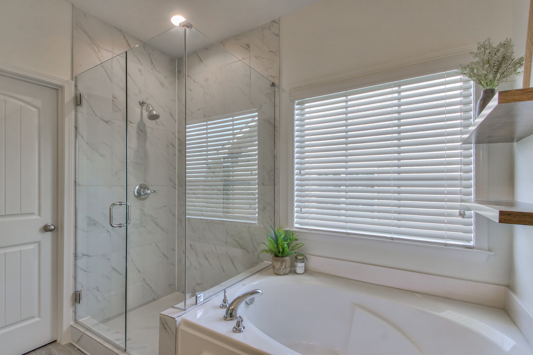 6032 Sanmar Drive Spring Hill, TN 37174 - Photo 18 of 29 a bathroom with a bathtub and shower